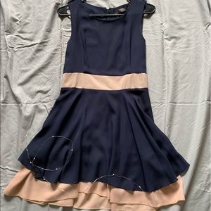 A Cute Flowy Navy Blue with Cream Accents Dress